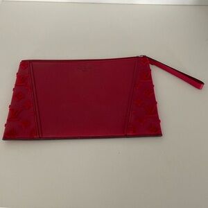 Red coloured Louis Vuitton Pochette/Wristlet with silver zipper.